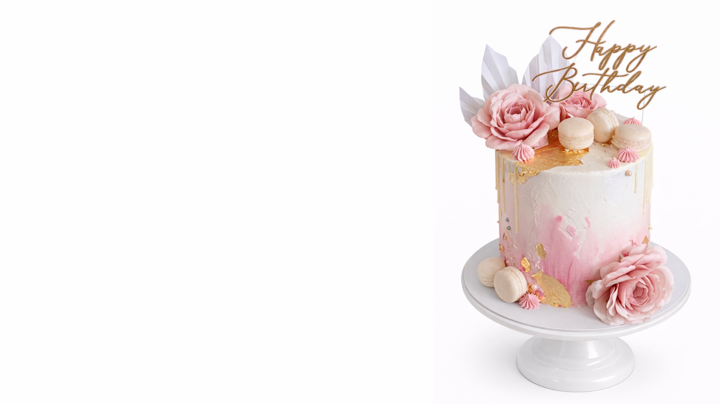 Custom floral birthday cake with pink roses and modern face design on white cake stand in Johannesburg