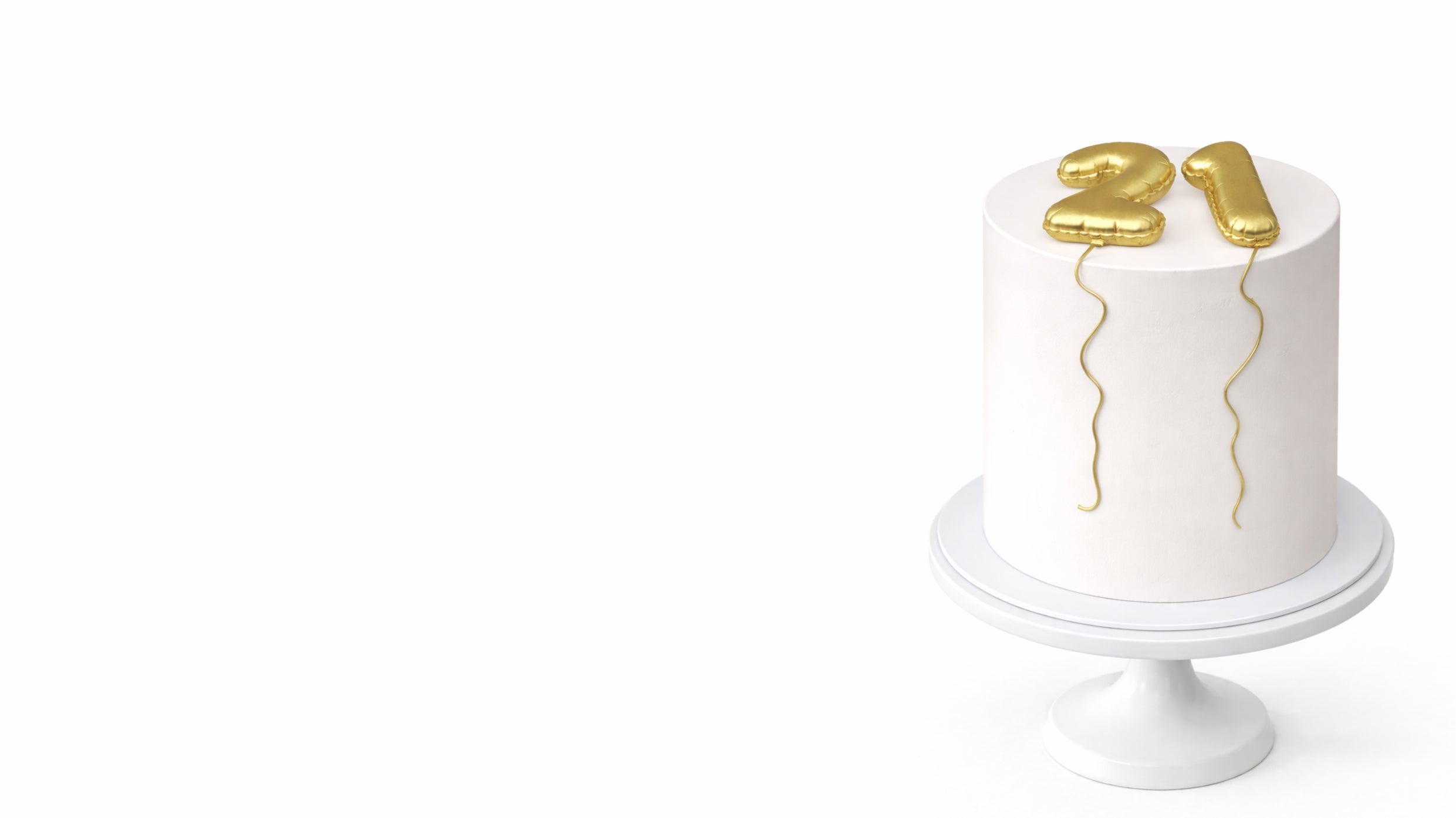 Minimalist 21st birthday cake with gold number toppers on white cake stand in Johannesburg