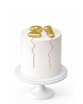 Luxury white celebration cake with gold number decoration