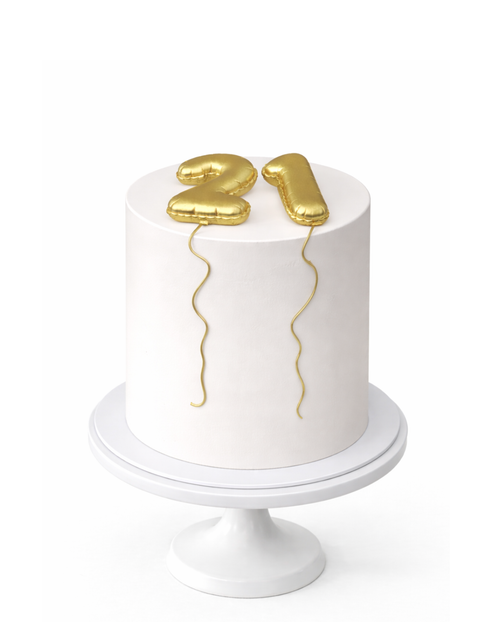 Luxury white celebration cake with gold number decoration