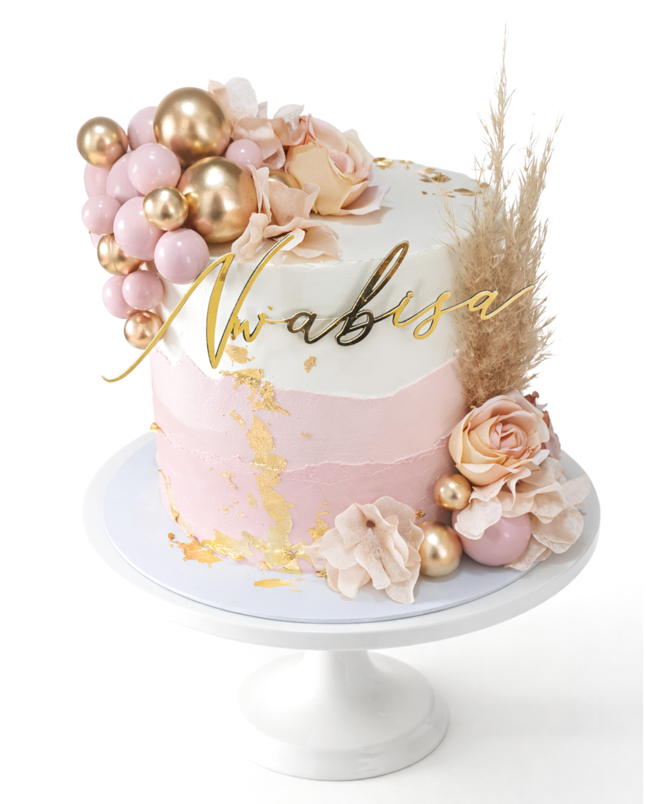 Elegant blush pink floral cake with gold detailing and handcrafted sugar flowers finished in white chocolate ganache on white cake stand