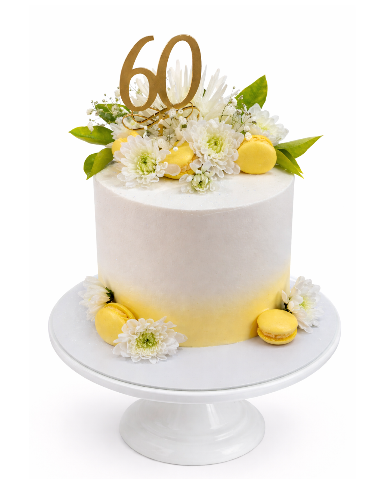 Elegant lemon themed cake with soft yellow ombre, floral decorations, macarons and gold 60 topper on white cake stand