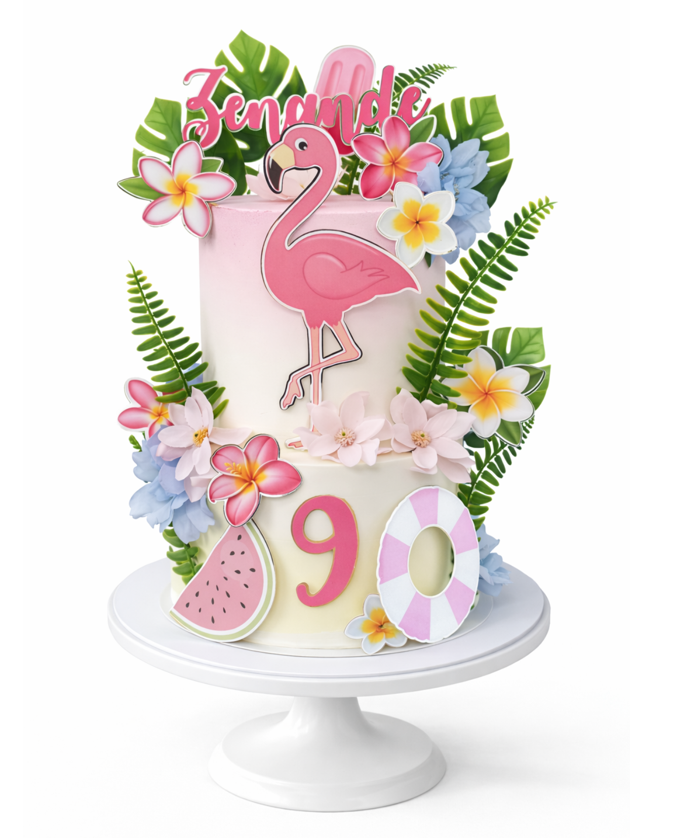 Two-tier flamingo themed birthday cake with tropical decorations, bright colours and smooth white chocolate ganache finish on white cake stand